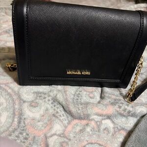 Michael Kors Elegant Black Crossbody Bag with Gold Accents